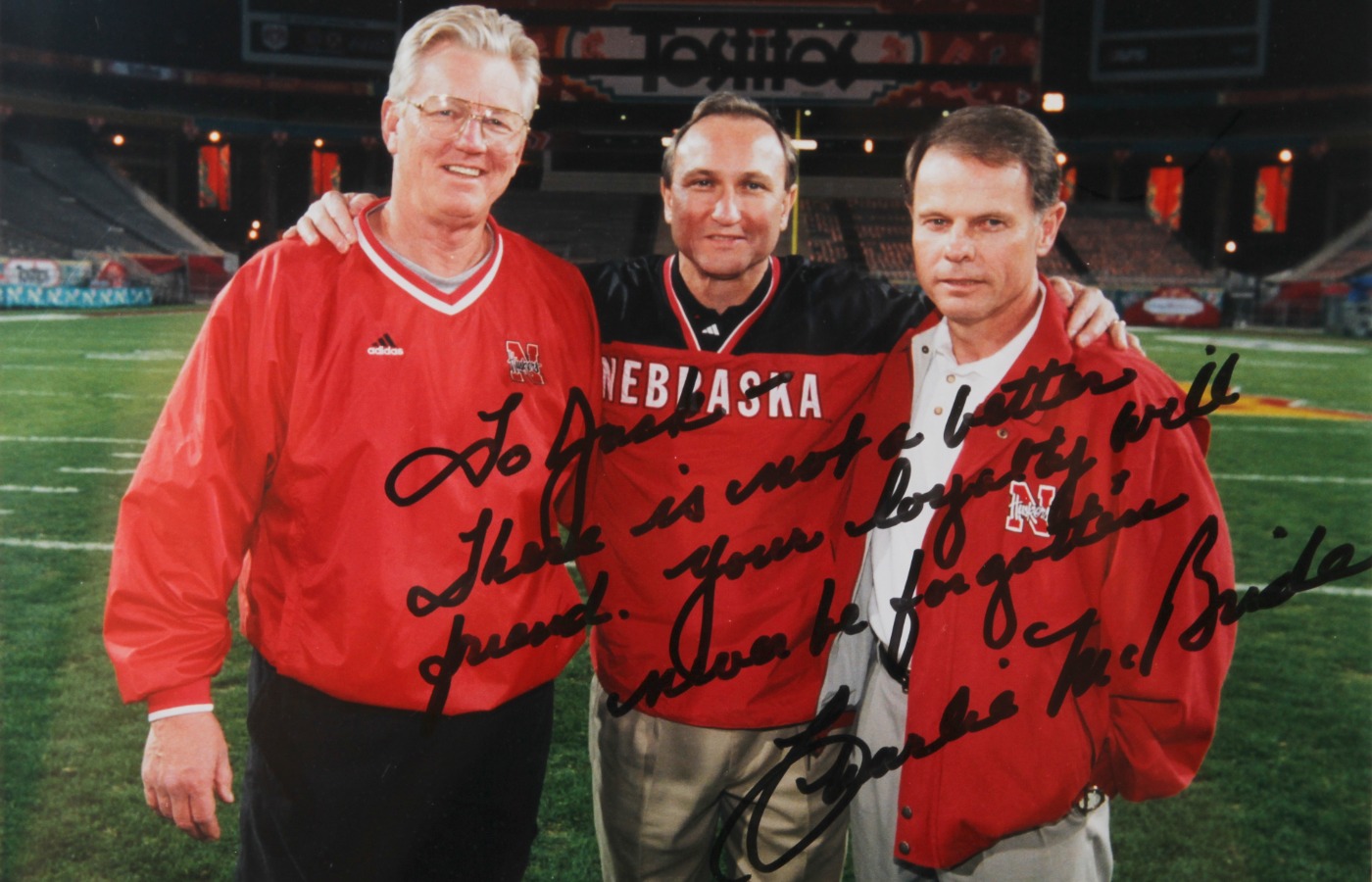 Dr. Stark with Charlie McBride and Frank Solich